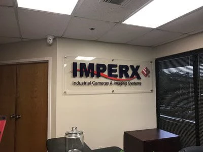 Acrylic signage with dimensional letters for Imperx