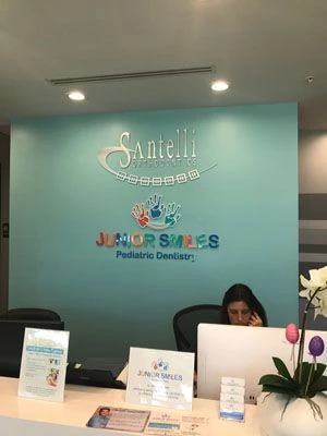 Junior Smiles acrylic office logo