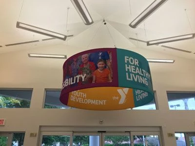 Hanging fabric display for the YMCA